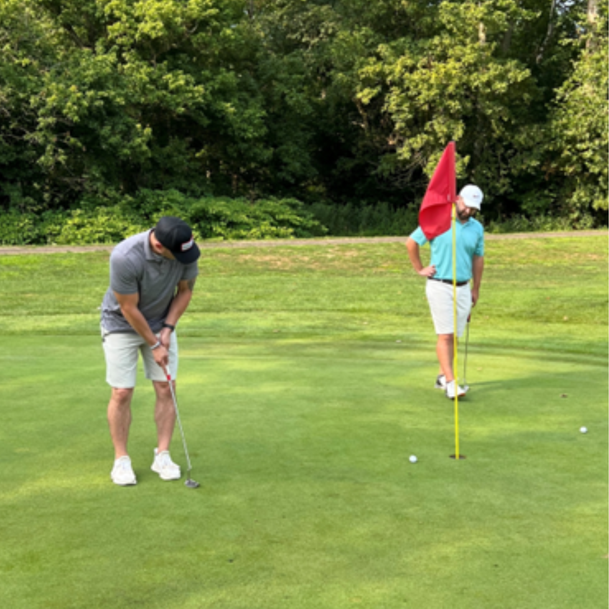 ECI employees golfing