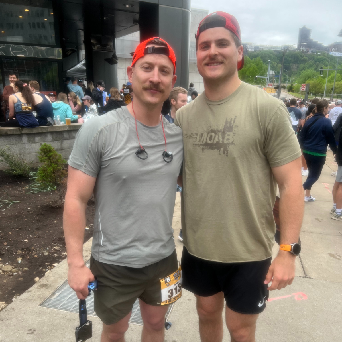 Two employees at the Pittsburgh Marathon.